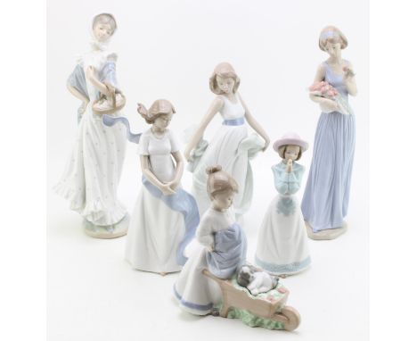 Nao figures to include a boy with wheel barrow, a girl with a basket ad others (6), 33cm tall.  In good condition with no obv