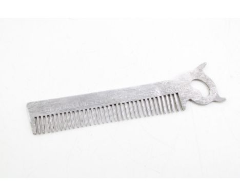 Early 20th century advertising comb 'USE ATKINS SAWS' in aluminium.  Likely to be E.C. Atkins &amp; Co, American saw and tool