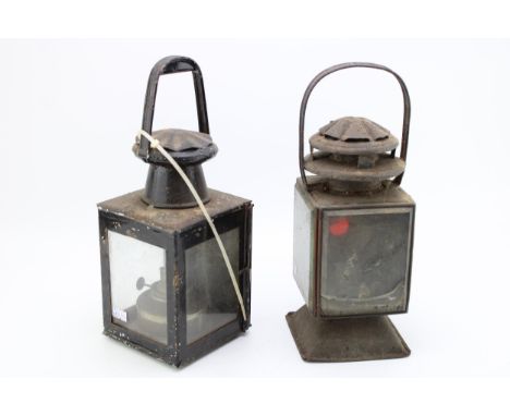 Two vintage railway lamps with oil burners, Height 34cm. (2)