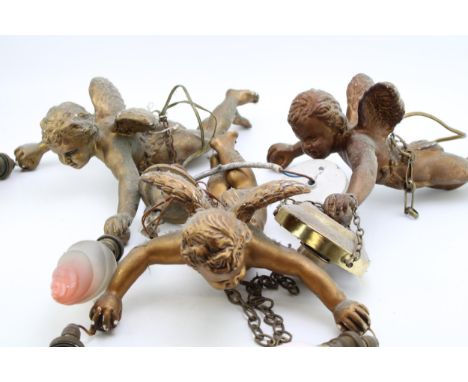 Three vintage ceramic light fittings in the form of cherubs. Gilt finish with attachments for celling fittings. 33cm x 28cm. 
