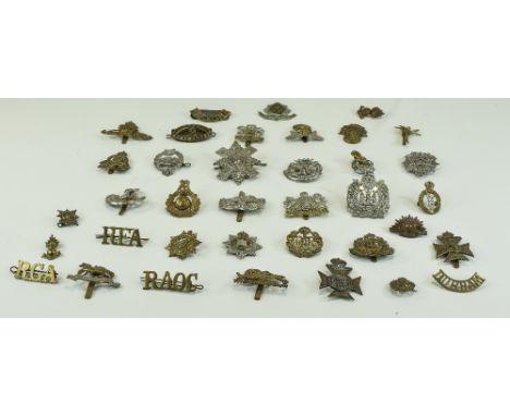 Military Interest. A Collection of World 1 and World 2 Military Cap Badges ( 36 ) In Total. Includes Durham, Suffolk Reg, Sco