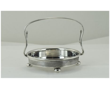 A Nice Quality Circular 1930's Sweetmeat Dish with Handle - Engine Turned Sides, Raised on 4 Ball Feet. Hallmark Sheffield 19