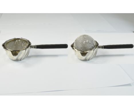 Norwegian Early 20th Century Silver Tea Strainer Held Above A Twin Lipped Bowl Of Vortex Shape, The Whole Raised With A Dark 