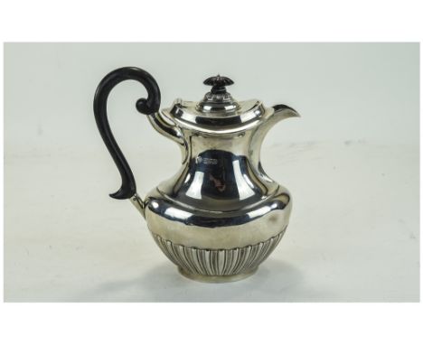 Silver Demi Fluted Coffee Pot, Ebonised Handle, Fully Hallmarked For Sheffield k 1902, Gross Weight 19toz.
Dent To Body