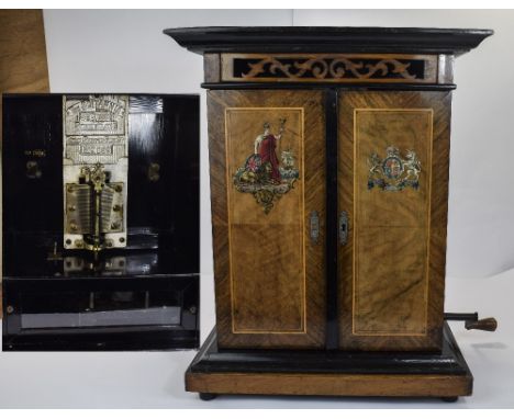 BRITANNIA 'SMOKERS CABINET' disc musical box, playing 91/8" (23.1cm) discs, twin comb model, with 35 discs (2 new) c1900