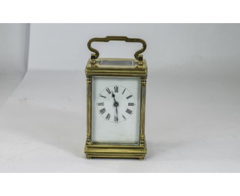 English Brass 8 Day Carriage Clock With Key, Circa 1900-1910 Features Visible Escapement, White Porcelain Dial, Corinthian Co
