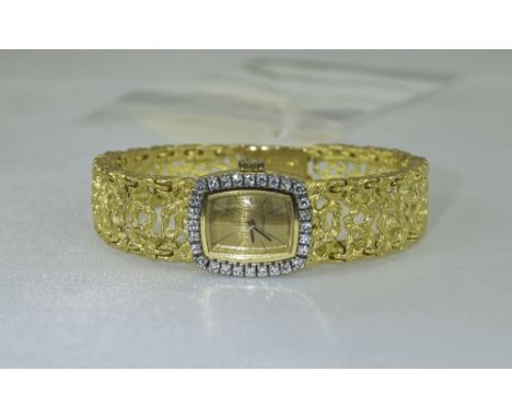 Ladies 18ct Gold Omega Wristwatch, Barrel Shaped Dial With Diamond Bezel Set With 28 Round Cut Diamonds, Manual Wind. Texture