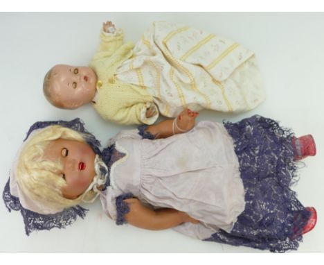 Vintage ceramic faced doll with moving eyes and another Canadian baby doll (2)
