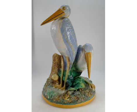 A Majolica large figure group of a pair cranes & frog by tree trunk, height 46cm (unmarked and crack to base)