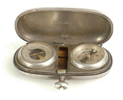 Tiffany silver cased barometer and compass explorer set, London 1912.  Thermometer and bow missing.  6.8cm dia.