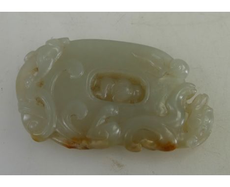 Qing Dynasty (1644-1911) A Chinese white Jade Boy & Dragon pendant, height 6.2cm