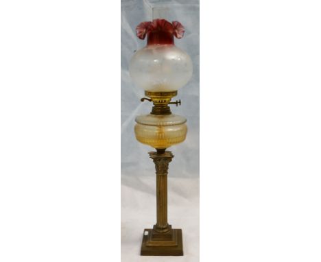 19th century brass oil lamp, Corinthian column with etched cranberry glass shade, height 80cm