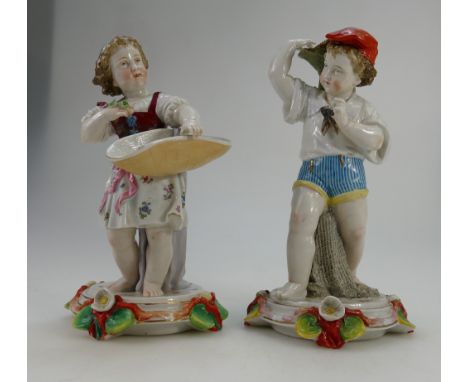 Pair porcelain figures of boy and girl both holding baskets, painted with flowers and marked with blue R (possibly Ludwigsbur