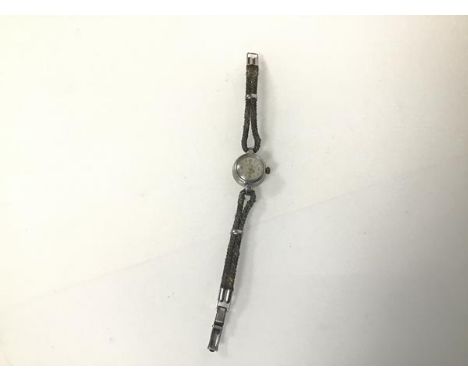 A vintage Omega Ladymatic chrome plated wristwatch with double plaited strap (not working) (15cm x 2cm)