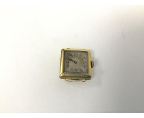 A vintage lady's 18ct gold square wristwatch with silvered dial and arabic numerals, working (2cm x 2.5cm) (14.27g)