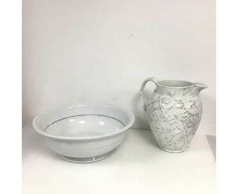 A wash basin and ewer, ewer with abstract branch decoration (h.26cm x 26cm x 20cm)