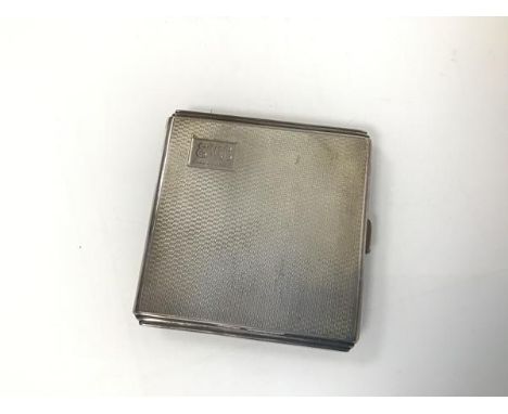 A Birmingham silver engine turned cigarette case with initials EML and the date May, 1944 engraved to front (8cm x 8cm) (108.