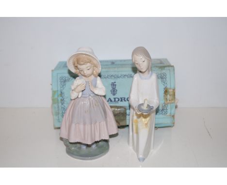 Nao figure of a girl together with a Lladro figure (a/f)