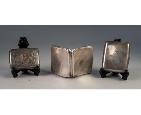 THREE EARLY TWENTIETH CENTURY SILVER CIGARETTE CASES, one engine turned, one engraved autour centering cursive initials in a 