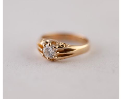 SOLITAIRE DIAMOND RING. A round brilliant cut diamond in an extended claw setting, estimated diamond weight 0.60ct approximat