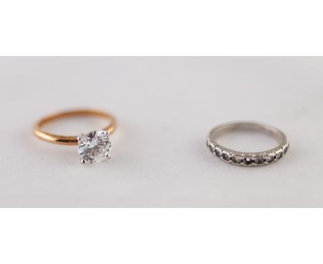 9ct WHTE GOLD HALF ETERNITY RING set wit eleven white stones (one missing), 2.2gms AND A COSTUME SOLITAIRE RING (2)