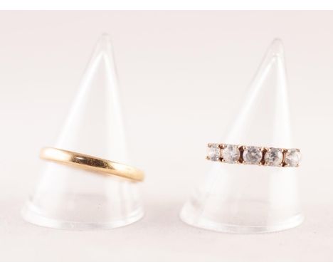 9ct GOLD RING SET WITH A ROW OF FIVE WHITE STONES, 1.8gms and a GOLD COLOURED METAL WEDDING RING (tests as 18ct), 3gms