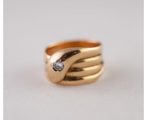 GEORGE V 18ct GOLD DIAMOND SNAKE RING. With round brilliant cut diamond set head, to a coiled shank, estimated diamond weight