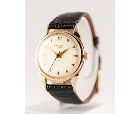 GENTS LONGINES 14ct GOLD SWISS WRIST WATCH WITH 17 JEWEL MOVEMENT round silvered dial with baton and sweep seconds hand, leat
