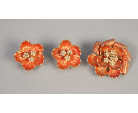 CHRISTIAN DIOR ENAMEL AND PASTE SET FLORAL BROOCH AND EARRINGS SUITE, CIRCA 1967, of white paste central clusters with peach 