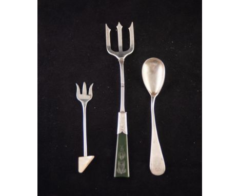 AN EARLY TWENTIETH CENTURY STERLING SILVER PICKLE FORK, with green jade handle, carved in intaglio with an eastern figure, al
