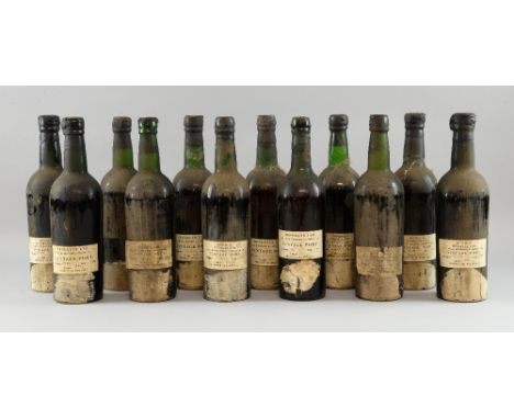 12 bottles of vintage port bottled by Henekeys Ltd. Including 7 bottles of Warre's port (3 1960 vintage bottled 1962, 4 1958 