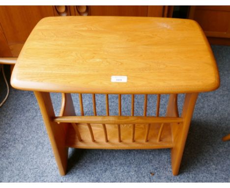 An Ercol elm and beech magazine rack/side table, cat no.1079 (modern), 55cm x 36cm