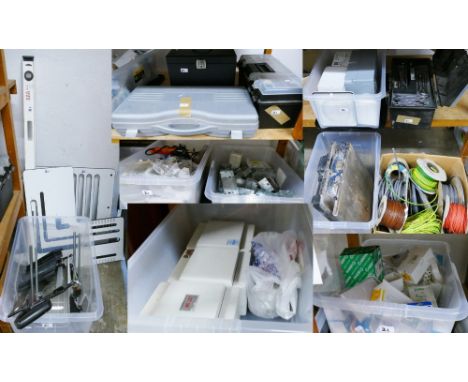 A good quantity of electrical fittings, wire etc, together with filing boxes, tool boxes, manual tile cutter, electric tile c