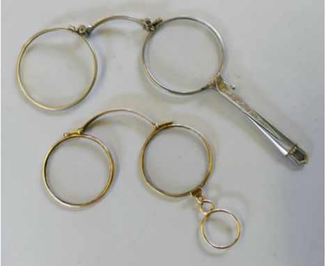 A pair of Victorian l'orgnettes, with yellow metal frames and figure-of-eight handle 6.5cm closed and another pair of white m