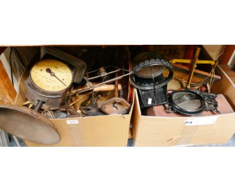 Two boxes of miscellaneous, including scales, school bell, companion set, horse brasses, wooden candle sticks, miniature long