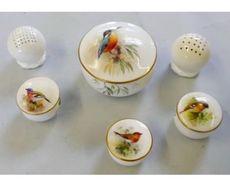 A Royal Worcester box and cover of bulbous circular form, three similar smaller boxes with lids painted with birds and a pair