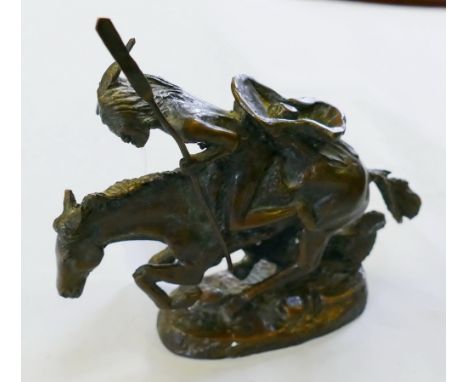 After Frederick Remington, a bronze sculpture of a native American Indian on horseback, 14cm high signed 
