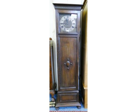 An oak longcase clock