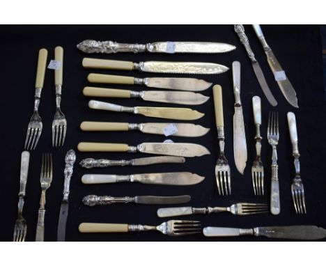 A set of six silver hafted butter knives; a set of six fish knives and forks; mother of pearl handles; another, similar; etc 