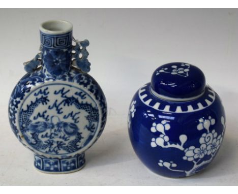 A 19th century Chinese blue and white moon flask; a blue and white lidded ginger jar, typically decorated with blossoming pru