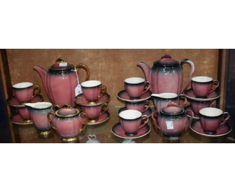 A Carlton Ware coffee set for six, comprising a coffee pot, sucrier and cover, cream jug, cups and saucers; another similar, 