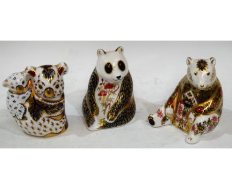 A Royal Crown Derby paperweight, Imari Honey Bear, gold stopper; others, Panda, gold stopper; Koala and Baby, gold stopper (3