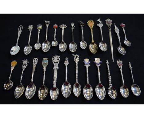 A silver and enamel souvenir teaspoon, Killarney; others similar; a paper knife; etc