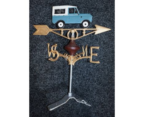 A reproduction cast metal ridge mountable weather vane, as a Land Rover