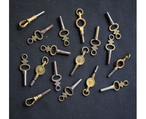 A collection of seventeen pocket watch keys