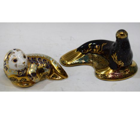 A Royal Crown Derby paperweight, Sea Lion, gold stopper, boxed; another, Harbour Seal, limited edition, 1717/4500, gold stopp