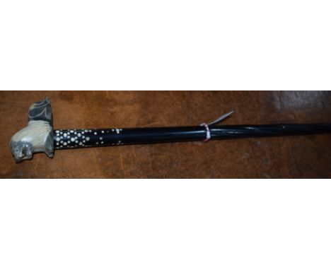 A Colonial ebony walking stick, associated horn handle carved as a recumbent lion, 84cm long 
