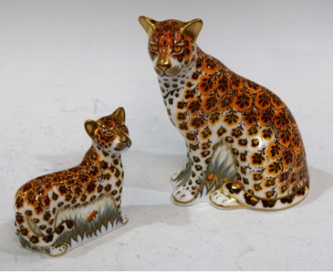 A Royal Crown Derby paperweight, Leopardess, gold stopper, boxed; another, Leopard Cub, gold stopper, boxed (2) Condition Rep