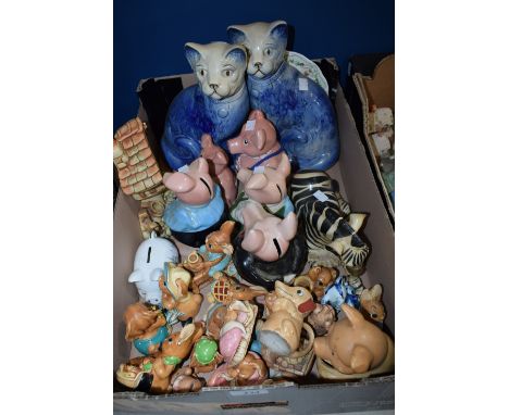 Ceramics - a set of five Nat West pig money banks; a Szeiler model of a zebra; Pendelfin rabbits; a pair of Arthur Wood mante