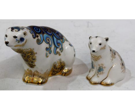 A Royal Crown Derby paperweight, Polar Bear, gold stopper, boxed; another, Polar Bear Cub Sitting, gold stopper, boxed (2) Co